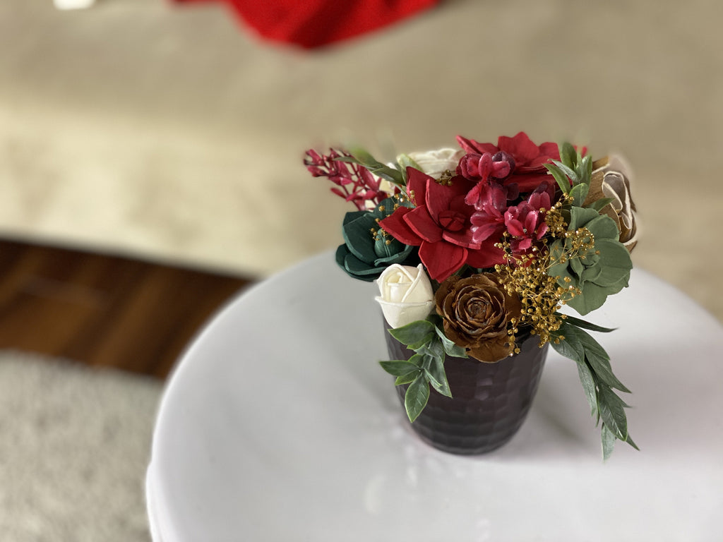 sola wood flower arrangement made of poinsettias, succulents, pine flowers that lasts!