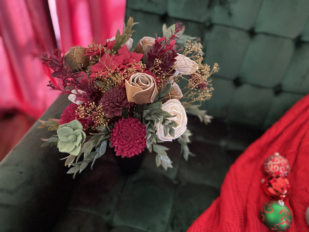 mini poinsettias and roses in a vase for christmas decor from pine and petal market